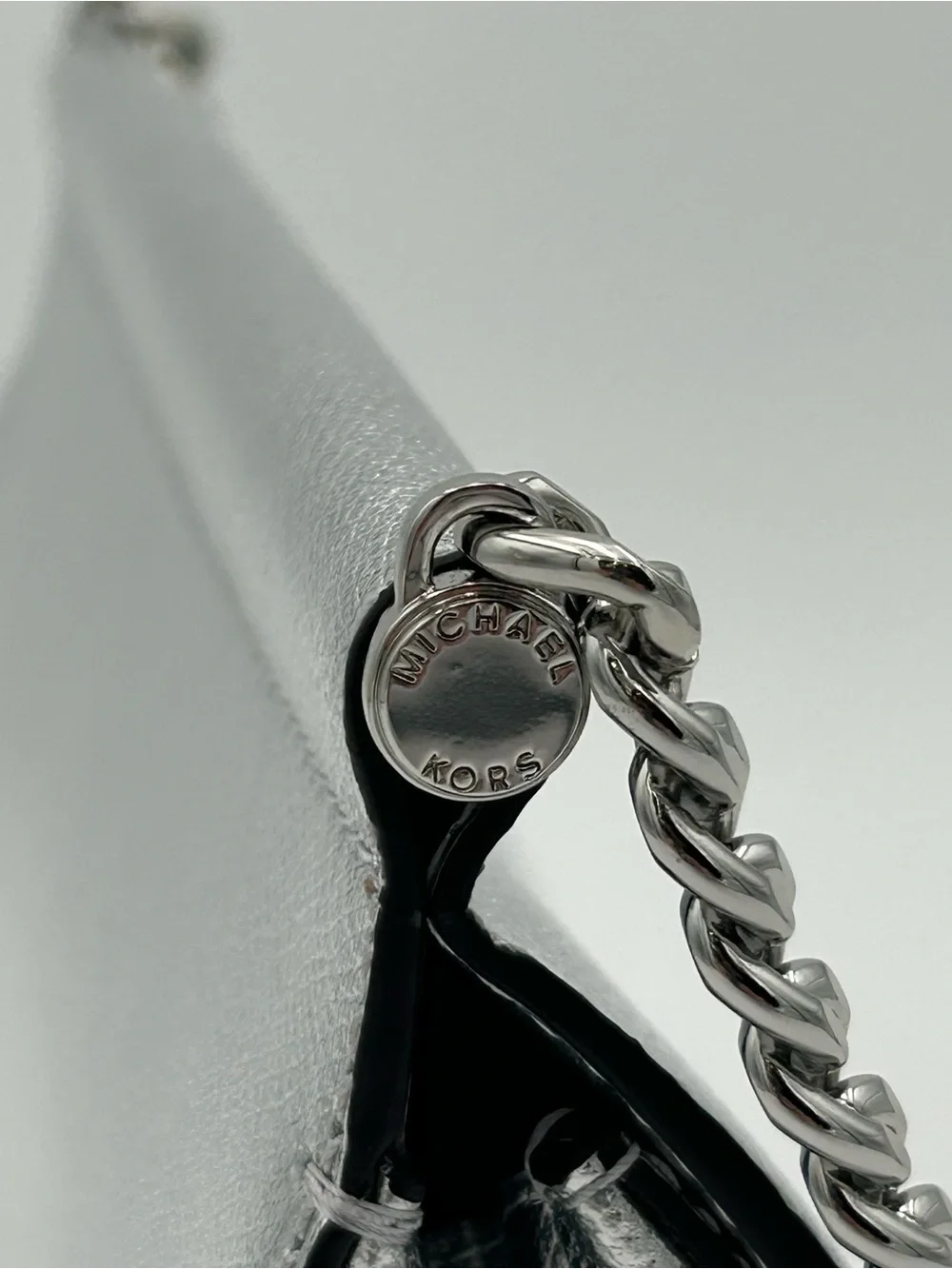 Michael Kors Carmine Silver Metallic Pebbled Leather Pochette